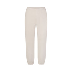DRAPEY FRENCH TERRY CROPPED JOGGER | BUFF FLAT ON A WHITE BACKGROUND | FLT