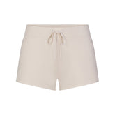 DRAPEY FRENCH TERRY SHORT | BUFF FLAT ON A WHITE BACKGROUND | FLT