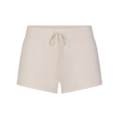DRAPEY FRENCH TERRY SHORT | BUFF FLAT ON A WHITE BACKGROUND | FLT