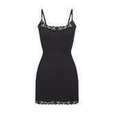 FITS EVERYBODY LACE SLIP DRESS | ONYX (MINI DRESSES) LAYS FLAT ON A WHITE BACKGROUND | FLT