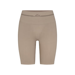 NikeSKIMS RIBBED SEAMLESS 5" BIKER SHORT | DRIFTWOOD LAYS FLAT ON A WHITE BACKGROUND | FLT