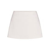 NikeSKIMS MATTE SKORT | IVORY LAYS FLAT ON A WHITE BACKGROUND | FLT