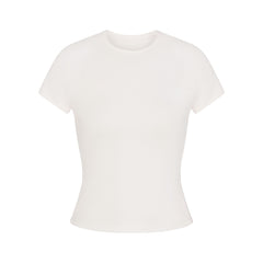 NikeSKIMS AIRY BABY TEE | IVORY LAYS FLAT ON A WHITE BACKGROUND | FLT