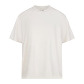 NikeSKIMS AIRY OVERSIZED TEE | IVORY LAYS FLAT ON A WHITE BACKGROUND | FLT