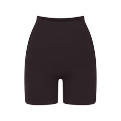 NikeSKIMS STUDIO STRETCH 5" BIKER SHORT | DARK ROAST LAYS FLAT ON A WHITE BACKGROUND | FLT