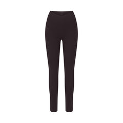 NikeSKIMS STUDIO STRETCH DIPPED 29" LEGGING | DARK ROAST LAYS FLAT ON A WHITE BACKGROUND | FLT