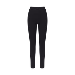 NikeSKIMS STUDIO STRETCH DIPPED 29" LEGGING | OBSIDIAN LAYS FLAT ON A WHITE BACKGROUND | FLT