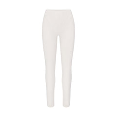 NikeSKIMS MATTE HIGH WAIST CORSET 26" LEGGING | IVORY LAYS FLAT ON A WHITE BACKGROUND | FLT