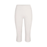 NikeSKIMS MATTE CROP 17" LEGGING | IVORY LAYS FLAT ON A WHITE BACKGROUND | FLT
