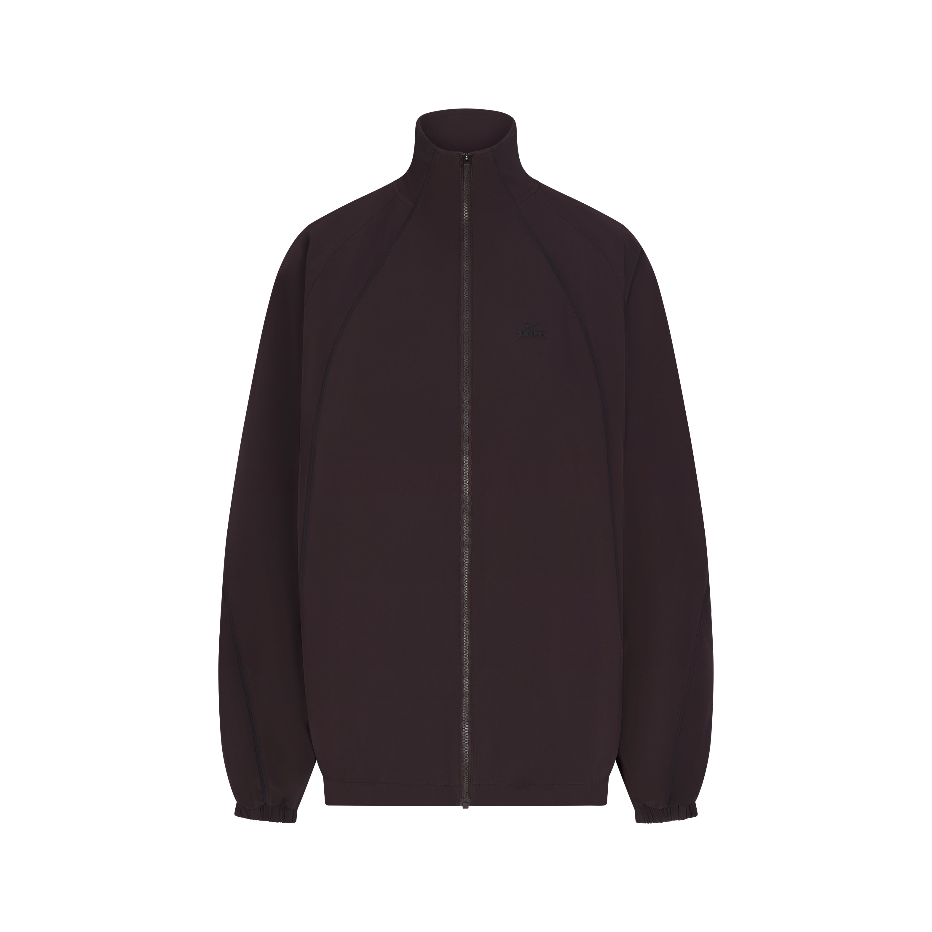 NikeSKIMS STRETCH NYLON OVERSIZED TRACK JACKET | DARK ROAST & LAYS FLAT ON A WHITE BACKGROUND | FLT