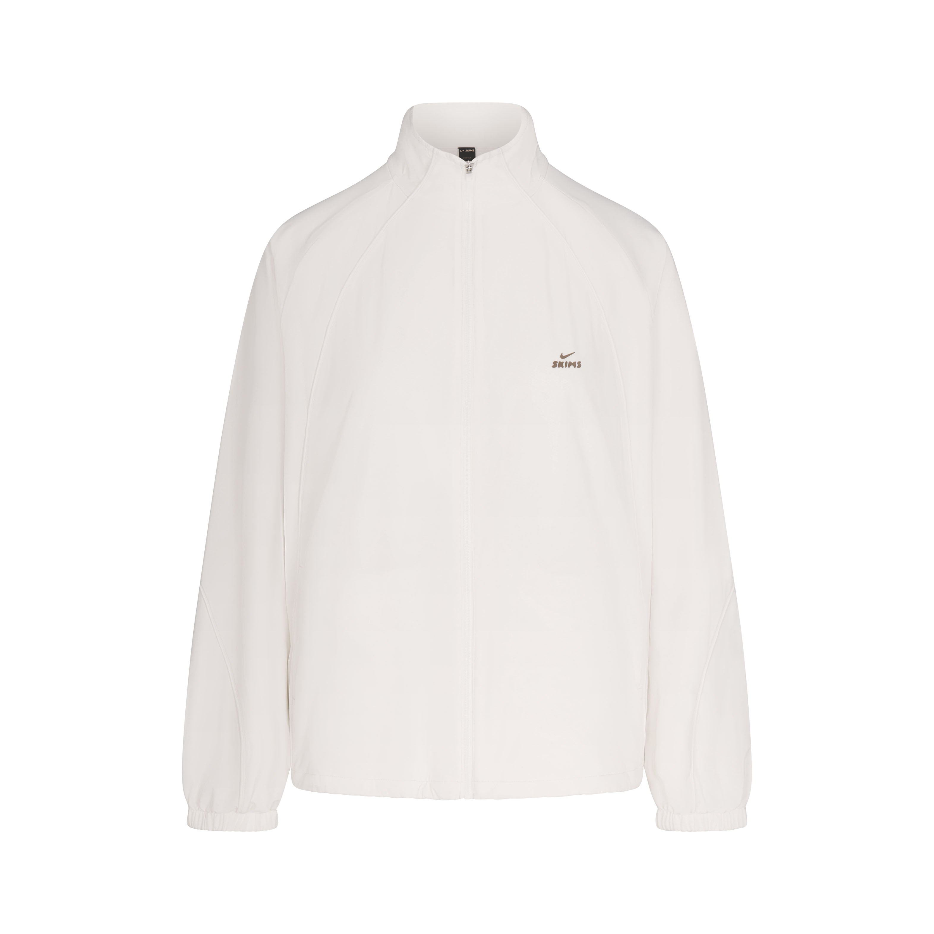 NikeSKIMS STRETCH NYLON OVERSIZED JACKET | IVORY LAYS FLAT ON A WHITE BACKGROUND | FLT