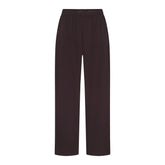 NikeSKIMS STRETCH NYLON OVERSIZED PANT | DARK ROAST & LAYS FLAT ON A WHITE BACKGROUND | FLT