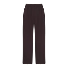 NikeSKIMS STRETCH NYLON OVERSIZED PANT | DARK ROAST & LAYS FLAT ON A WHITE BACKGROUND | FLT