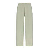 NikeSKIMS STRETCH NYLON OVERSIZED PANT | TALC & LAYS FLAT ON A WHITE BACKGROUND | FLT