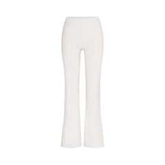 NikeSKIMS MATTE SLIM FLARE LEGGING | IVORY LAYS FLAT ON A WHITE BACKGROUND | FLT