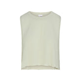 NikeSKIMS PERFORMANCE COTTON BLEND CROP TANK | TALC & LAYS FLAT ON A WHITE BACKGROUND | FLT