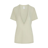 NikeSKIMS PERFORMANCE COTTON BLEND SHORT SLEEVE V-NECK TOP | TALC & LAYS FLAT ON A WHITE BACKGROUND | FLT