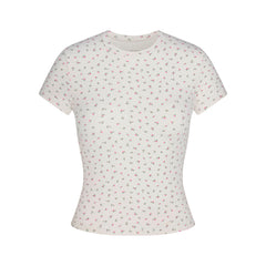 NikeSKIMS MATTE PADDED BABY TEE | DITSY FLORAL PRINT LAYS FLAT ON A WHITE BACKGROUND | FLT