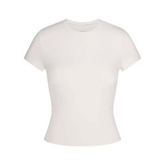 NikeSKIMS MATTE PADDED BABY TEE | IVORY LAYS FLAT ON A WHITE BACKGROUND | FLT