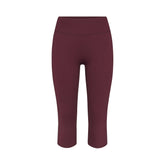 NikeSKIMS MATTE CROP 17" LEGGING | CURRANT FLAT ON A WHITE BACKGROUND | FLT