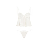 SKIMS ROMANCE BABYDOLL TOP AND STRING THONG SET | IVORY LAYS FLAT ON A WHITE BACKGROUND | FLT