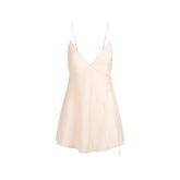 SKIMS ROMANCE MINI SLIP DRESS | PRIMROSE FLAT ON A WHITE BACKGROUND | FLT