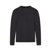 SKIMS COTTON MENS CLASSIC LONG SLEEVE T SHIRT ONYX FLAT ON A WHITE BACKGROUND | FLT | FLT
