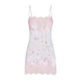 LIGHTWEIGHT SATIN MINI SLIP DRESS | SNOW ESSENTIALS BAG FLAT ON A WHITE BACKGROUND | FLT
