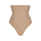 SKIMS BODY CORE SCULPT HIGH-WAISTED THONG | CLAY FLAT ON A WHITE BACKGROUND | FLT | FLT