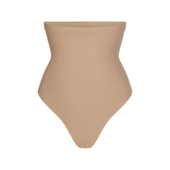 SKIMS BODY CORE SCULPT HIGH-WAISTED THONG | CLAY FLAT ON A WHITE BACKGROUND | FLT | FLT