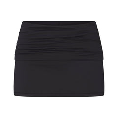 NikeSKIMS AIRY FOLDOVER SKORT | NSKM OBSIDIAN LAYS FLAT ON A WHITE BACKGROUND | FLT