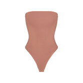 SMOOTH LAYERS STRAPLESS BODYSUIT | NUTMEG FLAT ON A WHITE BACKGROUND | FLT