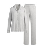 SKIMS SLEEP LONG SLEEVE BUTTON UP SET | LIGHT HEATHER GREY (LONG SLEEVE T-SHIRTS, BOTTOMS) LAYS FLAT ON A WHITE BACKGROUND | FLT