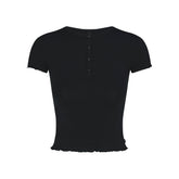 SKIMS SLEEP HENLEY AND FOLDOVER SHORT SET | ONYX FLAT ON A WHITE BACKGROUND | FLT