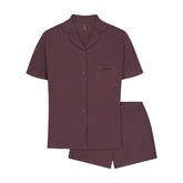 SKIMS SLEEP SHORT SLEEVE BUTTON UP SET | RAISIN FLAT ON A WHITE BACKGROUND | FLT