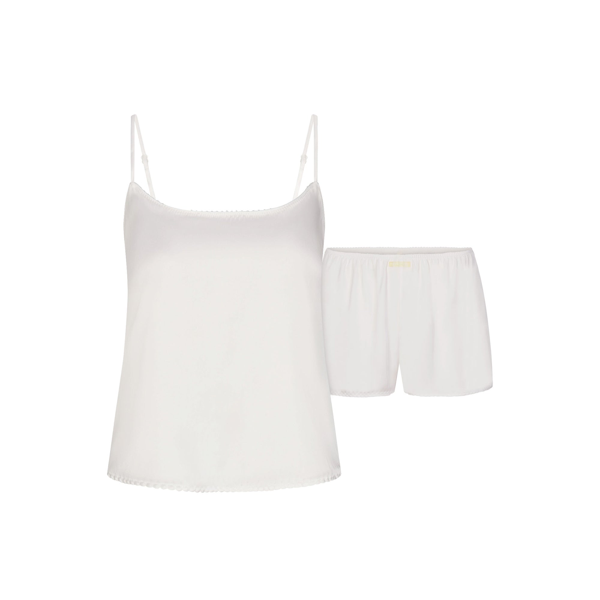 WOVEN SHINE CAMI AND SHORT SLEEP SET | IVORY LAYS FLAT ON A WHITE BACKGROUND | FLT