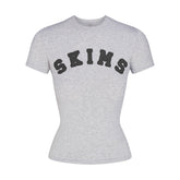 COTTON JERSEY T-SHIRT | LIGHT HEATHER GREY WITH ONYX LOGO FLAT ON A WHITE BACKGROUND | FLT