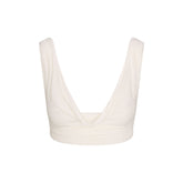 VETTESE X SKIMS SHEER MODAL DRAPED BRALETTE | ECRU FLAT ON A WHITE BACKGROUND | FLT