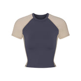 NikeSKIMS MATTE AND SHINE CREWNECK CROP SHORT SLEEVE | DEEP ROYAL/STONE FLAT ON A WHITE BACKGROUND | FLT