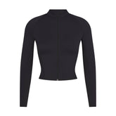 NikeSKIMS MATTE MOCK NECK FULL ZIP JACKET | OBSIDIAN FLAT ON A WHITE BACKGROUND | FLT