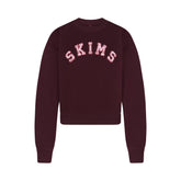 COTTON FLEECE CLASSIC CREWNECK | CURRANT ARCHED SKIMS PLAID & LAYS FLAT ON A WHITE BACKGROUND | FLT