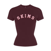 COTTON JERSEY LOGO T-SHIRT | CURRANT ARCHED SKIMS PLAID & LAYS FLAT ON A WHITE BACKGROUND | FLT