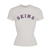 COTTON JERSEY LOGO T-SHIRT | LHG ARCHED SKIMS PLAID & LAYS FLAT ON A WHITE BACKGROUND | FLT