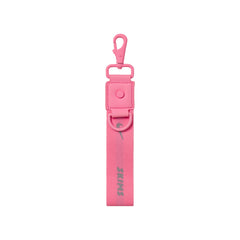 NikeSKIMS ACCESSORIES KEYCHAIN WRISTLET | LIGHT FLAMINGO LAYS FLAT ON A WHITE BACKGROUND