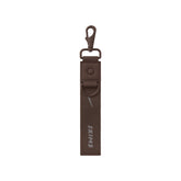 NikeSKIMS ACCESSORIES KEYCHAIN WRISTLET | PHOENIX FLAT ON A WHITE BACKGROUND