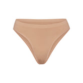 SOFT SMOOTHING SEAMLESS BRIEF | OCHRE (BRIEFS, PANTIES) LAYS FLAT ON A WHITE BACKGROUND | FLT