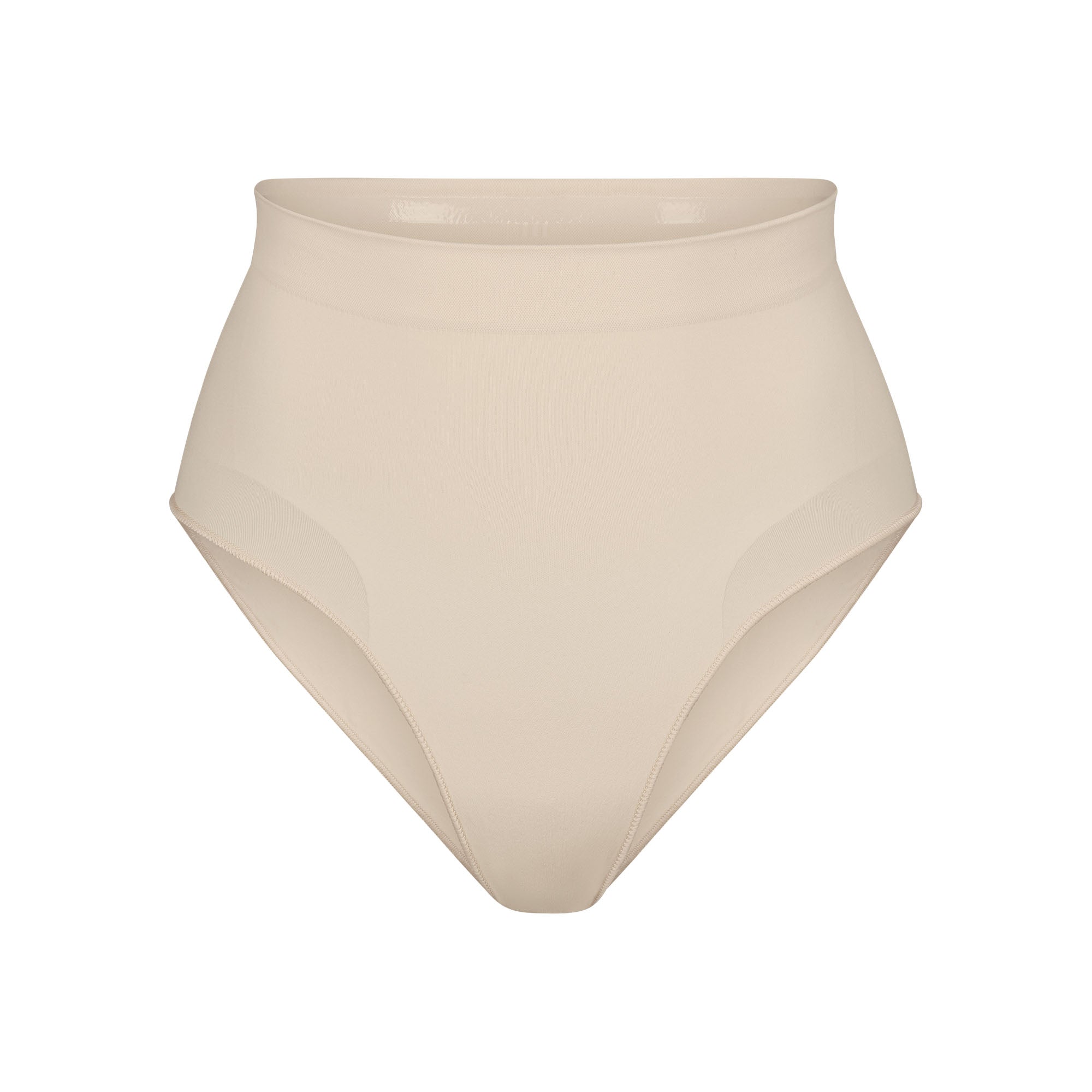 SEAMLESS SCULPT MID WAIST BRIEF | SAND (SHAPEWEAR BRIEFS, PANTIES) LAYS FLAT ON A WHITE BACKGROUND | FLT