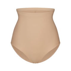 SKIMS BODY CORE SCULPT BUTT LIFTING BRIEF | CLAY FLAT ON A WHITE BACKGROUND | FLT