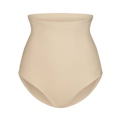 SKIMS BODY CORE SCULPT BUTT LIFTING BRIEF | SAND FLAT ON A WHITE BACKGROUND | FLT