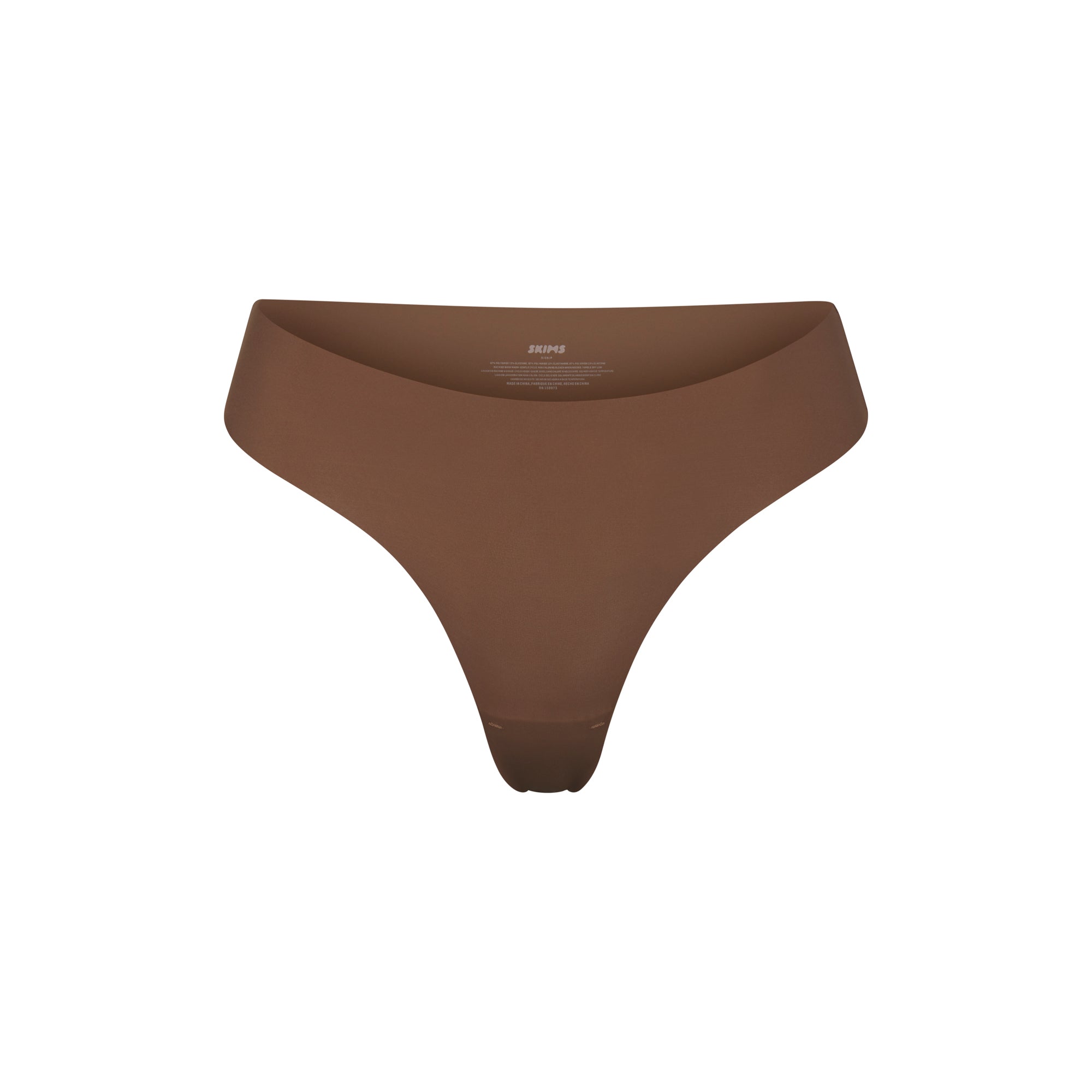 NAKED DIPPED THONG | JASPER (THONGS, PANTIES) LAYS FLAT ON A WHITE BACKGROUND | FLT